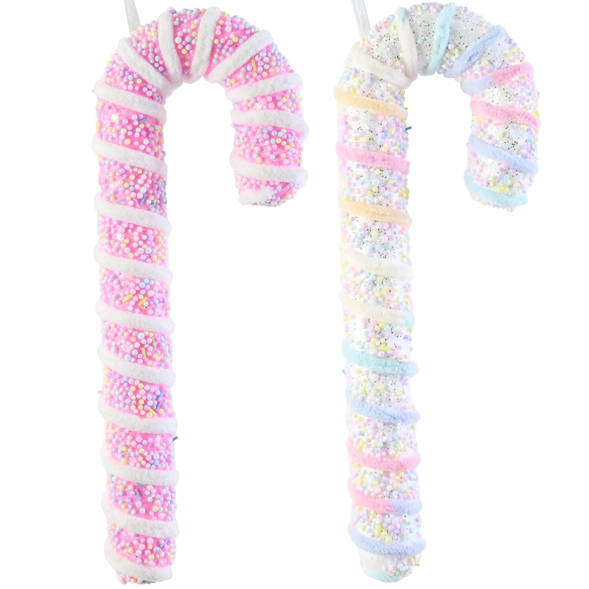 Two novelty lollipop-shaped decorations shaped like candy canes, decorated with white frosting swirls and pastel sprinkles, on a plain white background.
