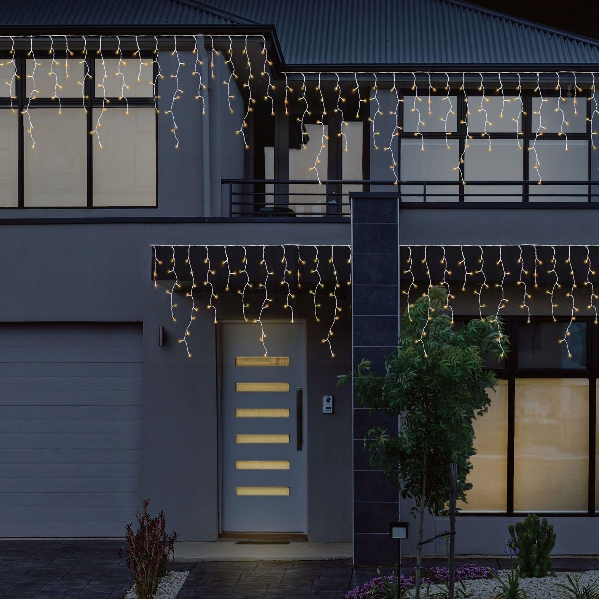 Christmas LED Snowing Icicles 1200 Warm Wht with Hooks - Christmas Collective NZ
