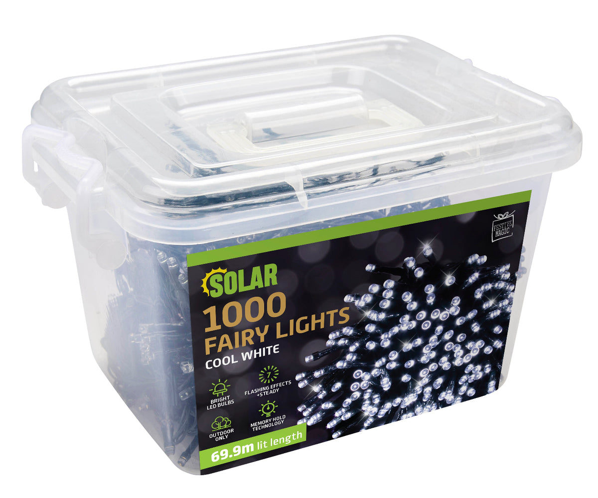 Solar 1000 fairy lights in cool white, packaged in a clear plastic storage container with a green and black label.