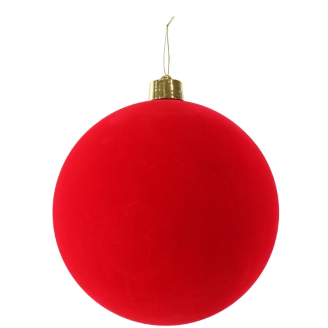 Red Christmas ball ornament with gold hook on a white background