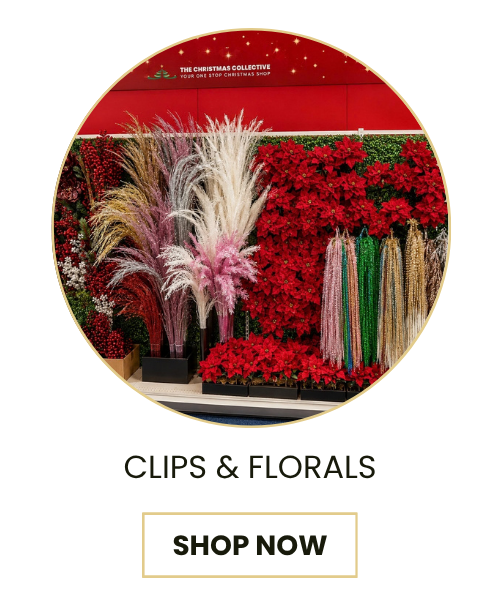 A promotional graphic for 'The Christmas Collective' showing a circular photo of decorative holiday florals, including red poinsettias, pampas grass, and hanging green and gold ribbons, with the text 'CLIPS & FLORALS' and a 'SHOP NOW' button below.